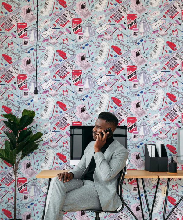 1980's Office Wallpaper featuring calculators, staplers, computers, phones on a messy desk • retro wallpaper insitu