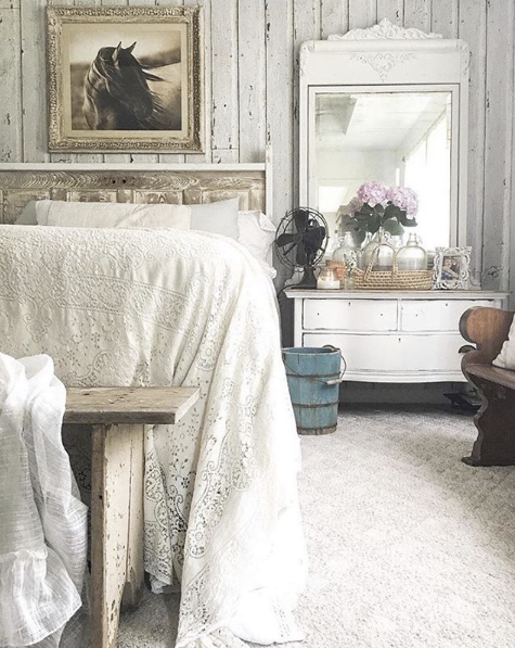 Queensland Weatherboards Wood Wallpaper installed behind a bed with lacey white linen