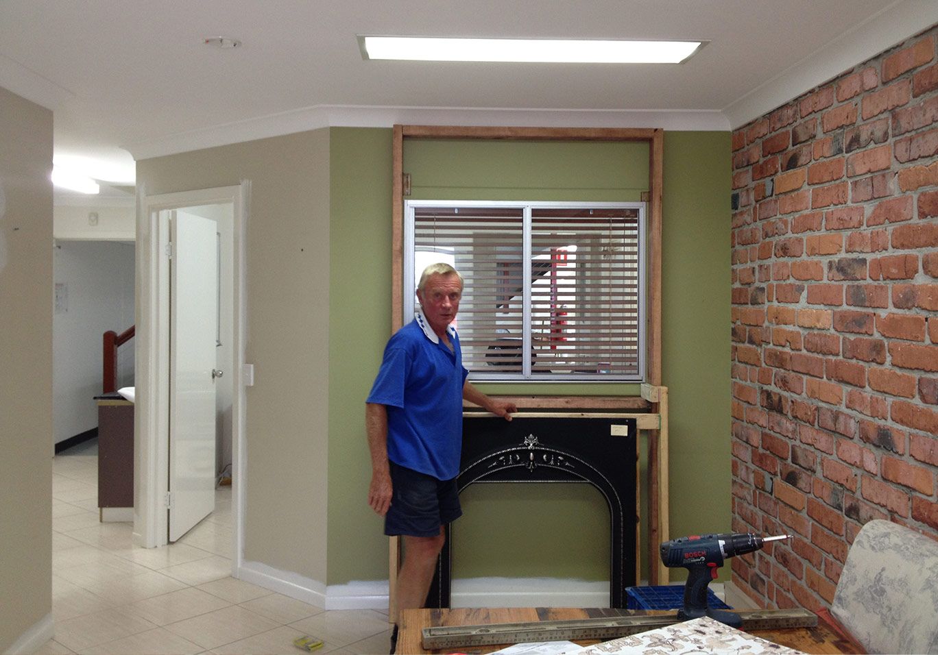 Building the Faux Fireplace in the Showroom